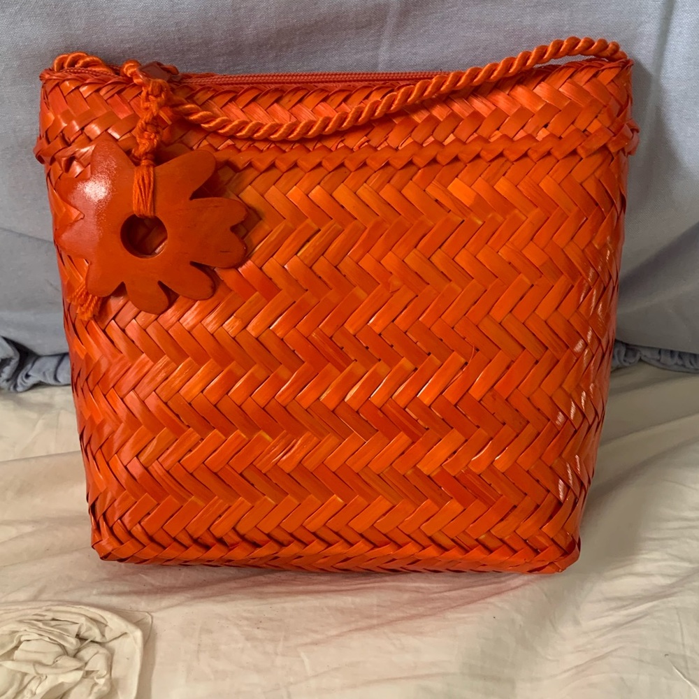 Never carried vintage orange woven handbag!